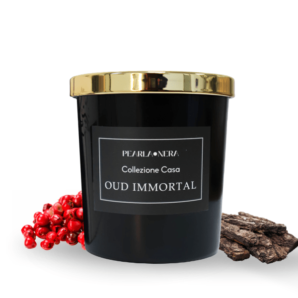 oud immortal scented candle by pearla nera | rose, woody, balsamic aromatherapy | pink pepper, lime, saffron, clove | long lasting tranquilizing candle amber jar