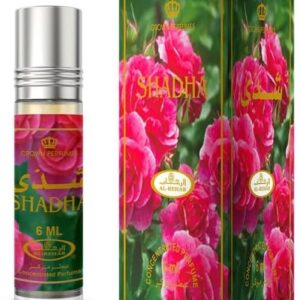 shadha oil bottle besides nature flower box